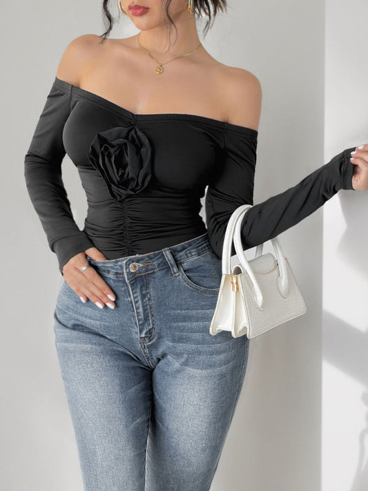 Perfee Ruched Flower Off-Shoulder Long Sleeve Bodysuit Black