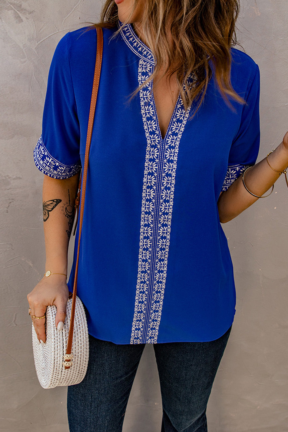 Embroidered V-Neck Top with Delicate Floral Design