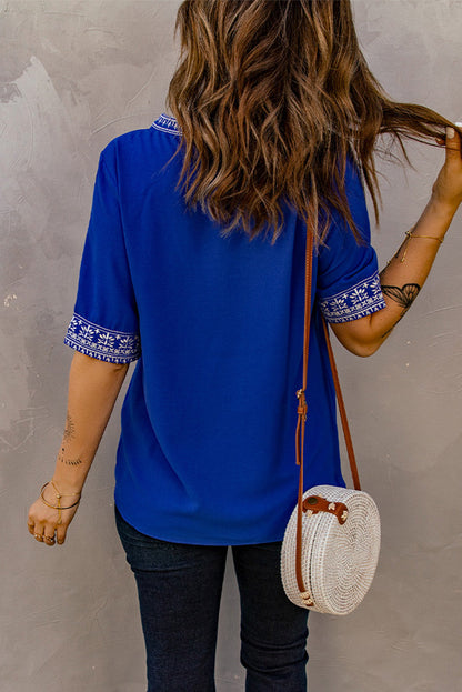 Embroidered V-Neck Top with Delicate Floral Design