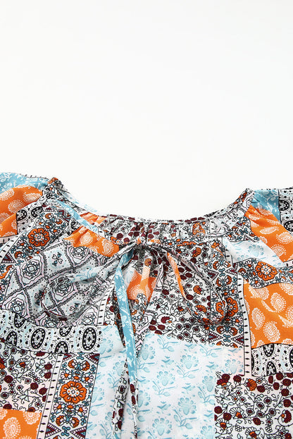 Printed Curved Hem Tie-Neck Top