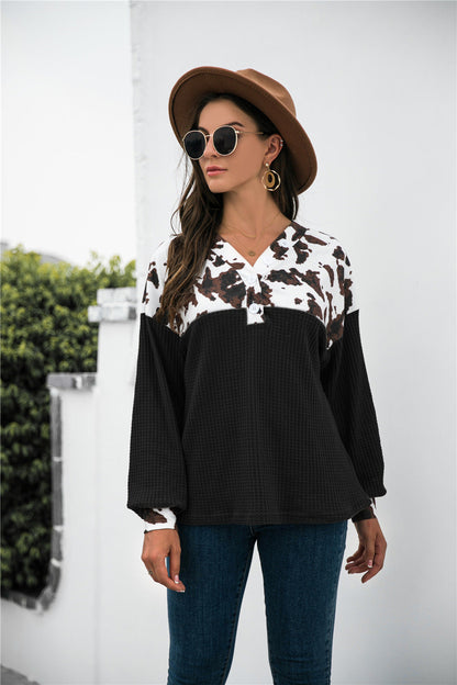 Stylish animal print waffle-knit blouse with color block design