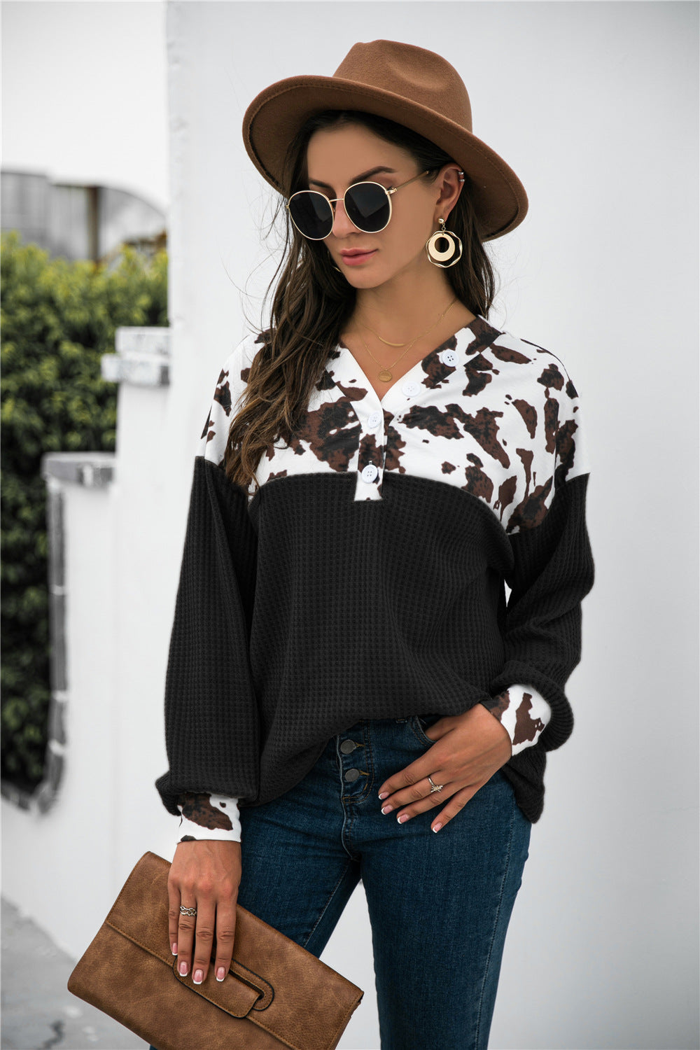 Stylish animal print waffle-knit blouse with color block design