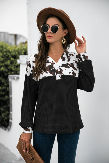 Stylish animal print waffle-knit blouse with color block design