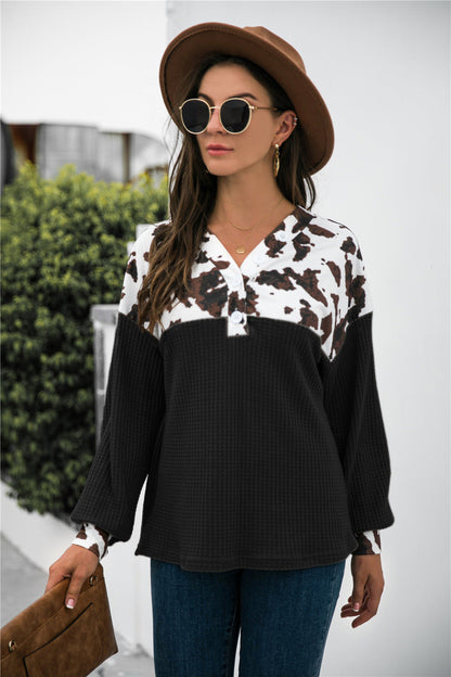 Stylish animal print waffle-knit blouse with color block design