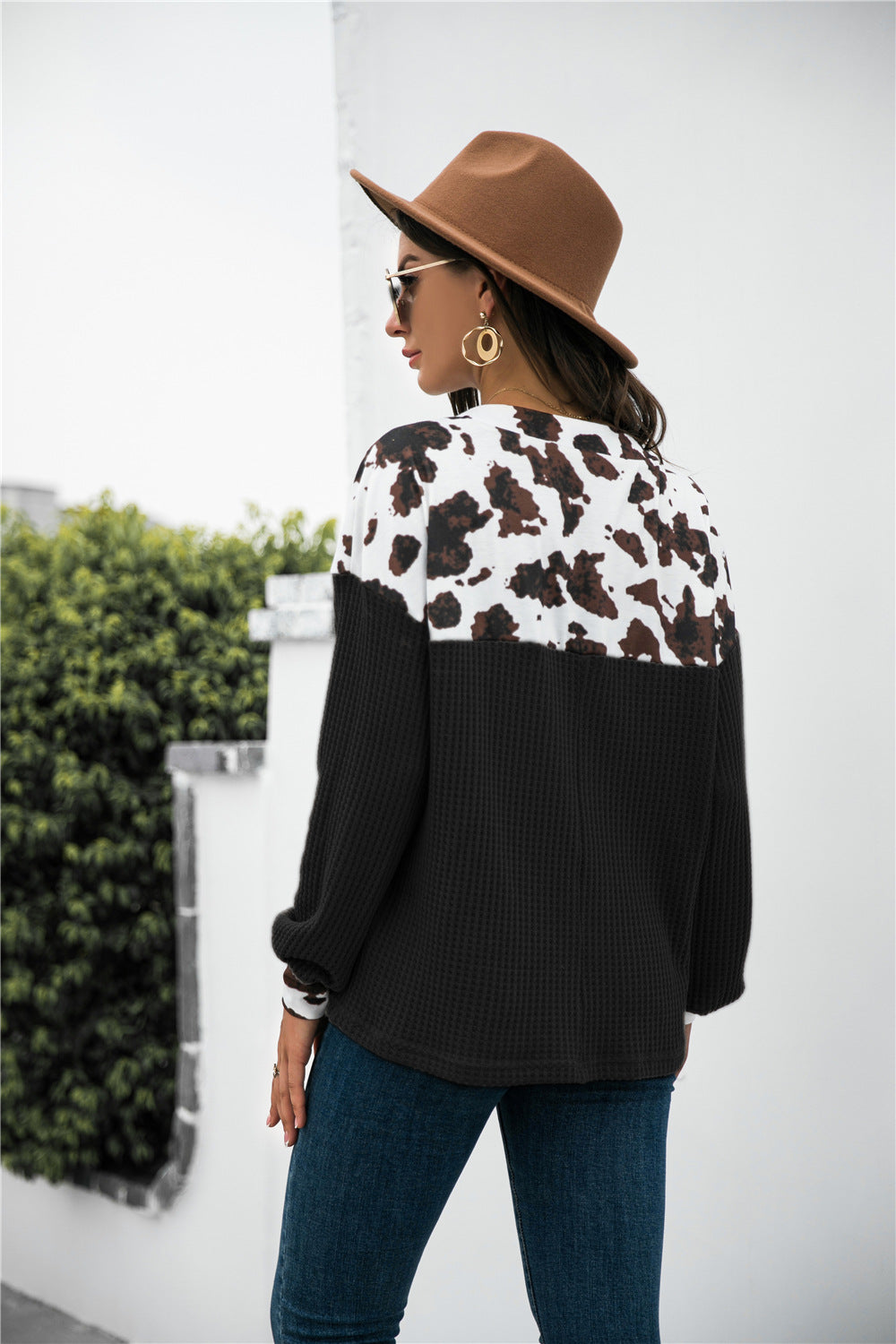 Stylish animal print waffle-knit blouse with color block design