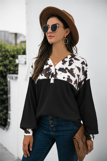 Stylish animal print waffle-knit blouse with color block design