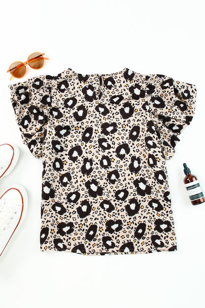 Stylish round neck blouse with animal print and puff sleeves