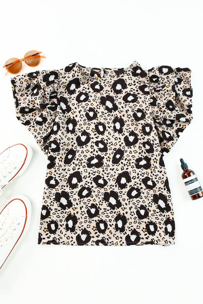 Stylish round neck blouse with animal print and puff sleeves