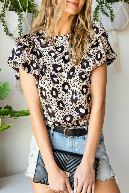 Stylish round neck blouse with animal print and puff sleeves